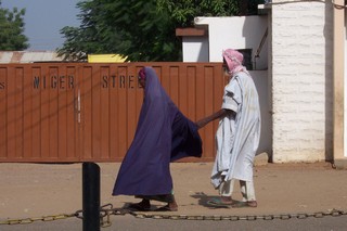 Old couple walking in Kano